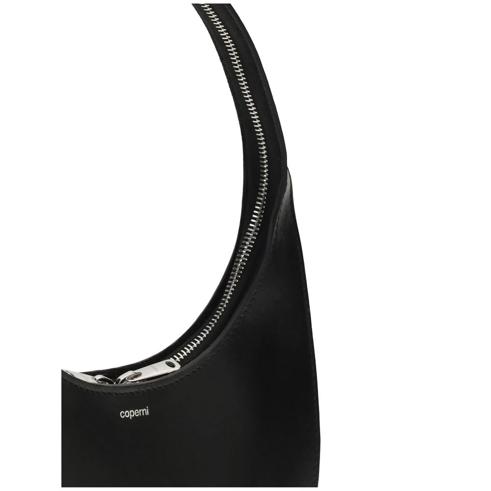 Coperni Black Leather Shoulder Bag with silver-tone zip and embossed logo, showcasing modern design.