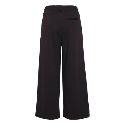 Rear view of ICHI Black Recycled Polyester Flared Pants with elastic waist, showcasing eco-friendly fashion with a modern silhouette.
