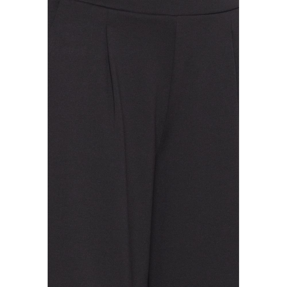 ICHI Black Recycled Polyester Flared Pants close-up showing fabric texture and pleats for modern, sustainable fashion.