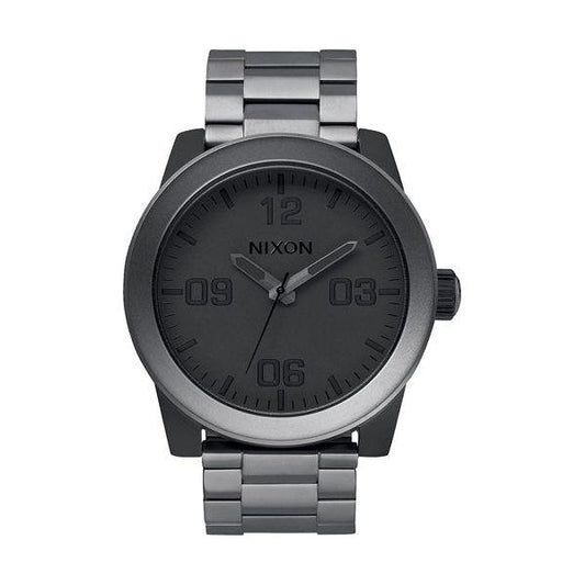 NIXON Corporal watch with gray metal band and minimalist design, featuring bold numbers and durable construction.