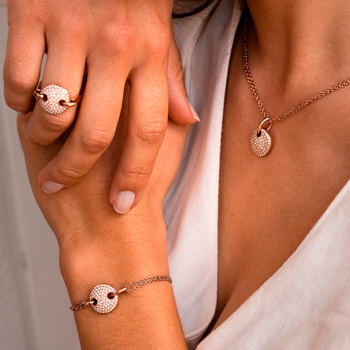 AN JEWELS JEWELRY Mod. AL.BJT01RC shows elegant necklace, bracelet, and ring in stylish design.