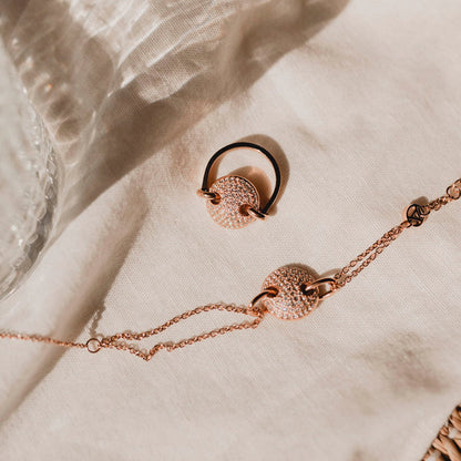 Elegant AN JEWELS JEWELRY Mod. AL.BJT01RC set displayed on white fabric background, showcasing intricate design.