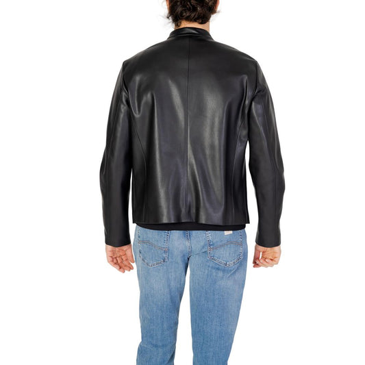 Man wearing Armani Exchange Black Polyester Jackets & Coat, showcasing stylish back view in an urban setting.
