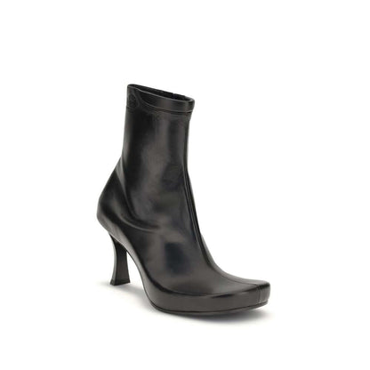 Balenciaga Black Calf Leather Bos Taurus Ankle Boots with embossed logos, ergonomic insole, and square toe. AW25 collection.