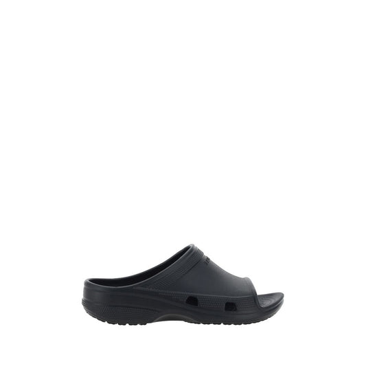 Balenciaga Eva Sandals in rubber, featuring an open toe design with embossed logo on the strap. Season: SS25. Composition: 100% Rubber.