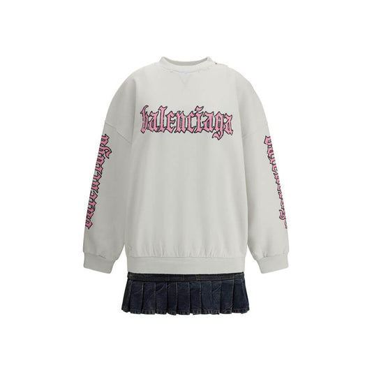 Balenciaga Multicolor Cotton Sweatshirt with ribbed collar, cuffs, and contrasting logo, combined with a denim pleated skirt for a unique look.