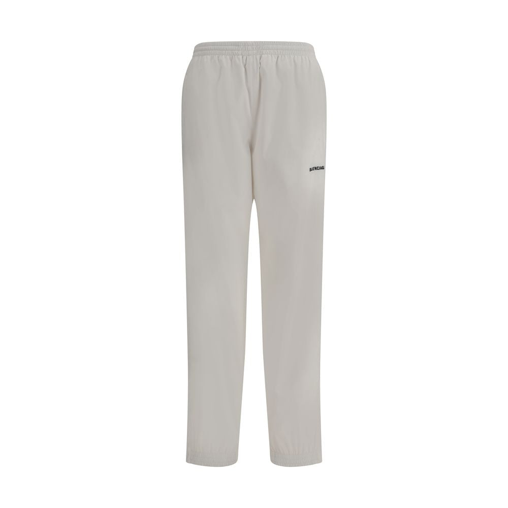 Balenciaga White Polyester Joggers (Workout Pants) featuring elastic waist and logo on front, ideal for upscale casual style.