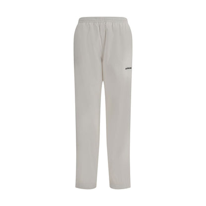 Balenciaga White Polyester Joggers (Workout Pants) featuring elastic waist and logo on front, ideal for upscale casual style.