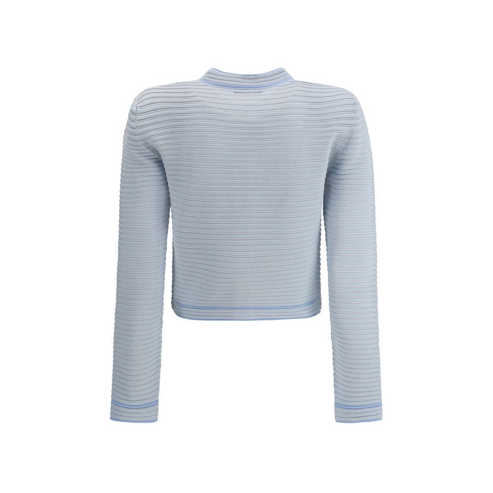 Back view of Balmain Light Blue Viscose Cardigan with ribbed texture, structured shoulders, and elegant long sleeves for a sophisticated look.
