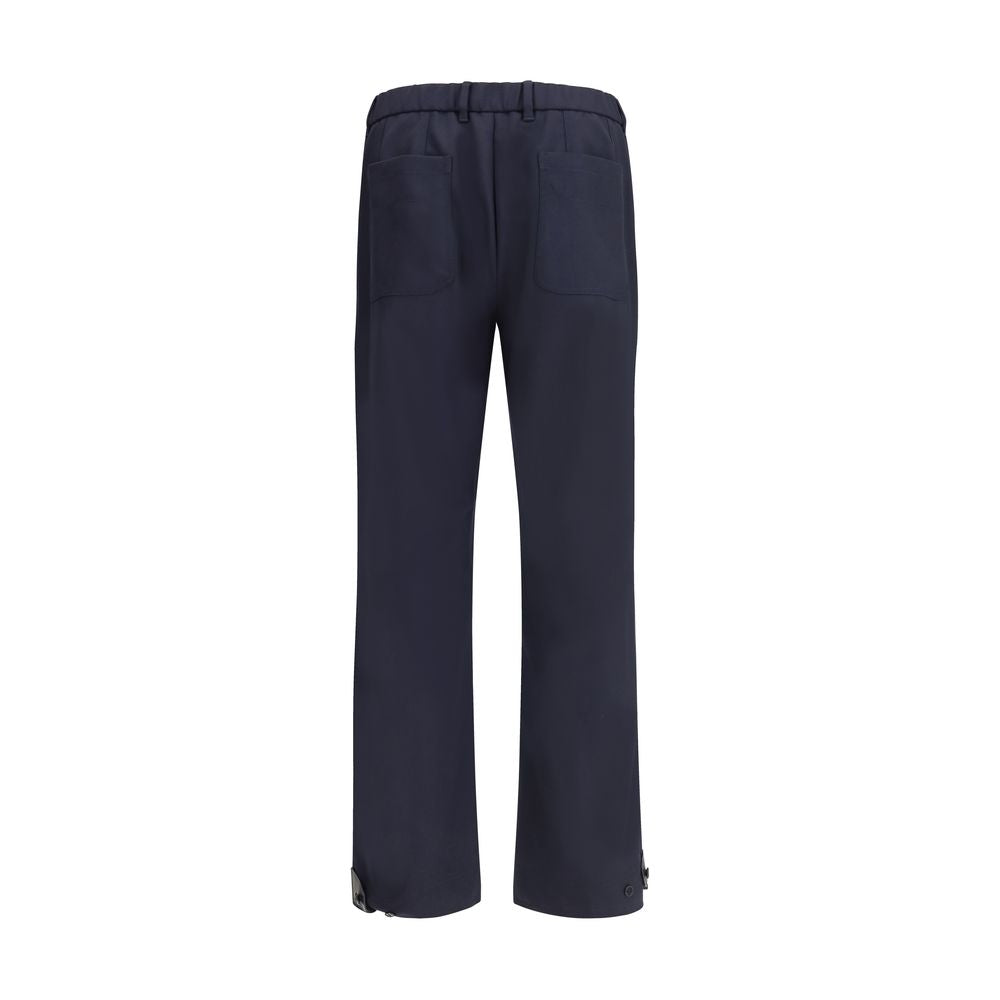 Brioni Blue Wool Casual Pants with elastic hem, belt loops, and patch pockets showcasing elegance and modern style for AW25 season.