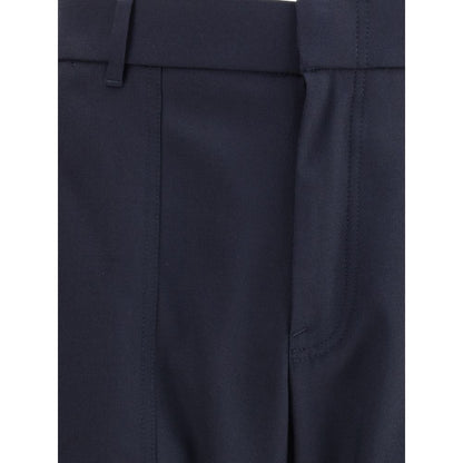 Brioni Blue Wool Casual Pants with zipper and hook front closure, elastic hem, and belt loops showcasing refined style and comfort.