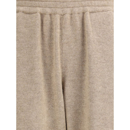 Close-up of Brunello Cucinelli Beige Cashmere Pants with elasticized waistband and soft tapering silhouette for casual wear.