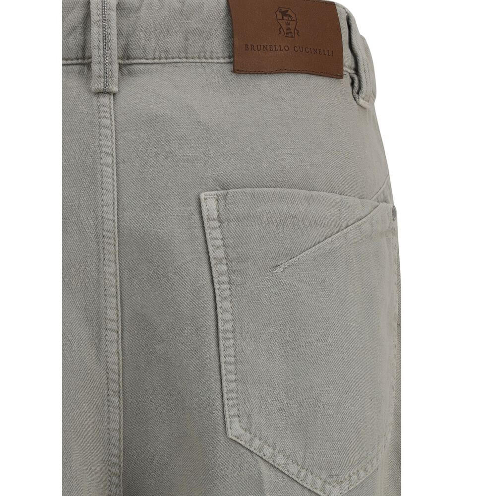 Detail view of Brunello Cucinelli Bicolor Cotton Relaxed Fit Jeans with logo leather patch and pocket