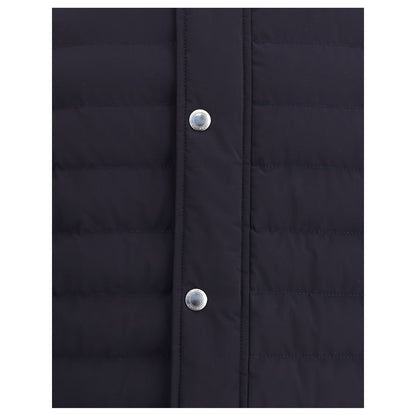 Close-up of Brunello Cucinelli Blue Polyester Coat showing snap-button detail and classic stitch pattern.