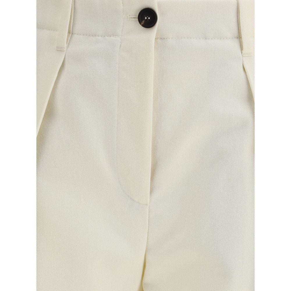 Close-up of Brunello Cucinelli Cream Cotton Casual Pants with front zipper-and-button closure and belt loops, showcasing elegant design.