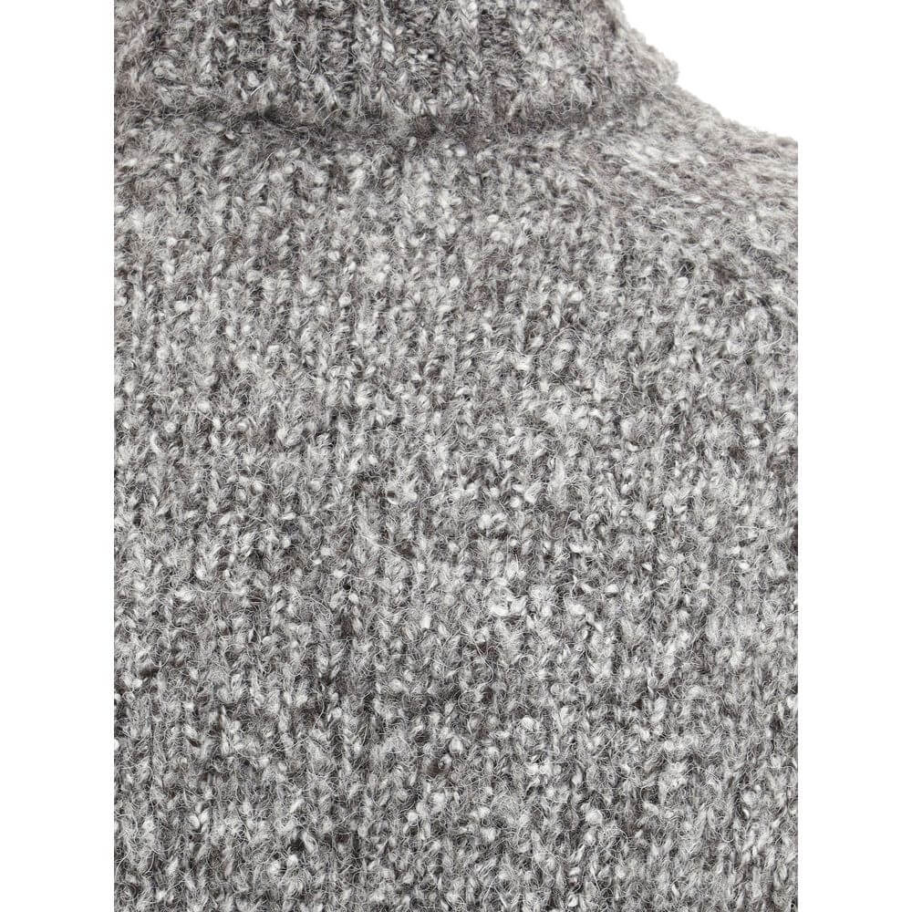 Close-up texture of Brunello Cucinelli Gray Alpaca Vicugna Pacos Turtleneck sweater, showcasing luxurious knitted detail and quality fabric.