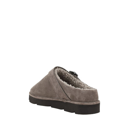Brunello Cucinelli Gray Calf Leather Bos Taurus Clogs with fur trim, knurled sole, and adjustable buckle for fall and winter style.