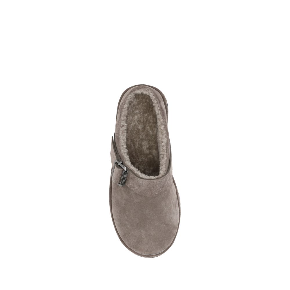Top view of Brunello Cucinelli Gray Calf Leather Bos Taurus Clogs with fur trim, knurled sole, and adjustable buckle detail.
