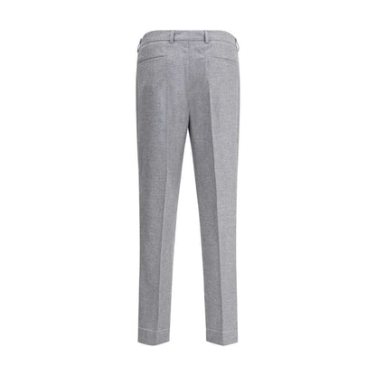Back view of Brunello Cucinelli Gray Cashmere Casual Pants with welt pockets and tapered legs, showcasing modern, relaxed elegance.