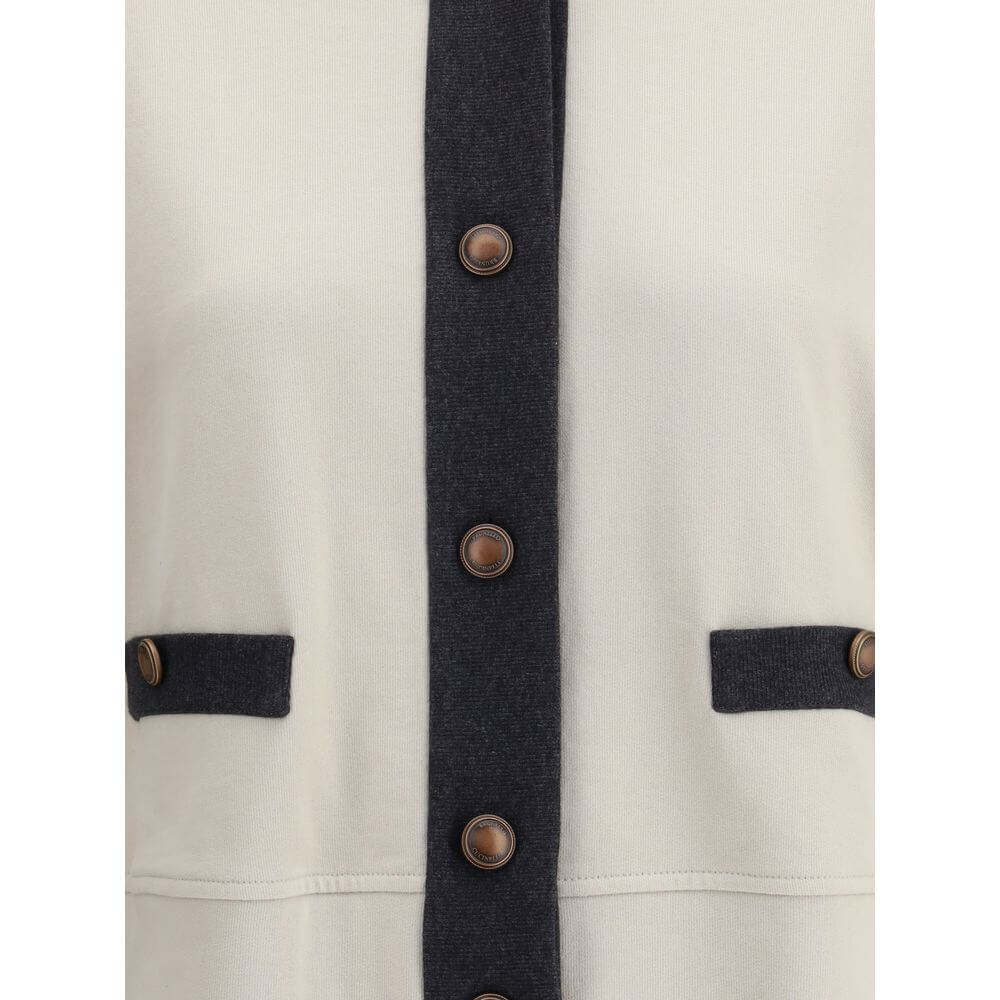 Close-up of Brunello Cucinelli Gray Cotton Cardigan with button closures and welt pockets.