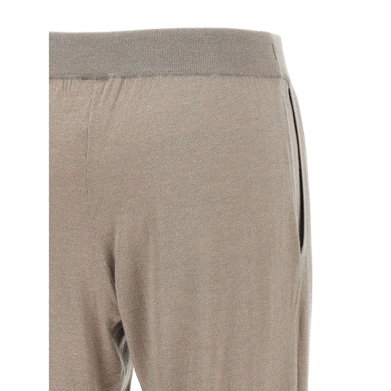 Close-up of Brunello Cucinelli Lurex-detail trousers with taupe grey color, elasticised waistband, and tapered leg design.