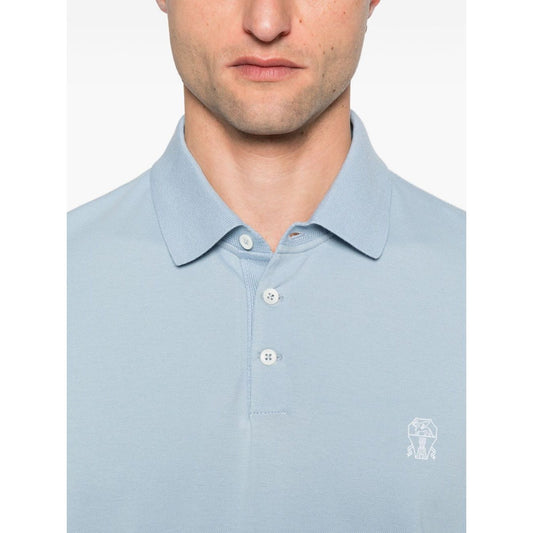 Brunello Cucinelli Polo shirt with embroidery in light blue cotton, featuring short sleeves, button placket, and embroidered logo detail.