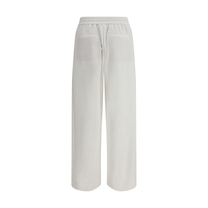 Back view of Brunello Cucinelli White Cotton Joggers (Workout Pants) with elastic waistband and welt pockets, showcasing casual elegance.