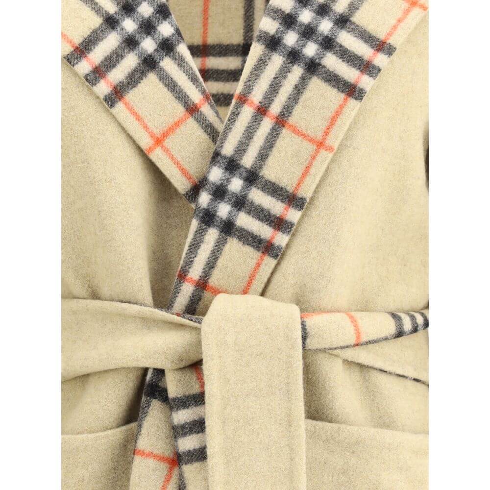 Close-up of Burberry Beige Wool Coat showing reversible Burberry Check pattern and belt detail.