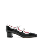CAREL PARIS With Heel Black patent leather pumps with double buckle and block heel on white background.