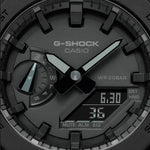 Close-up of CASIO G-SHOCK Mod. OAK - ALL BLACK wristwatch, featuring multifunction quartz movement and 20 ATM water resistance.