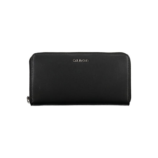 Calvin Klein Black Polyethylene Wallet with zip closure, 5 compartments, coin purse, card spaces, and removable pull.