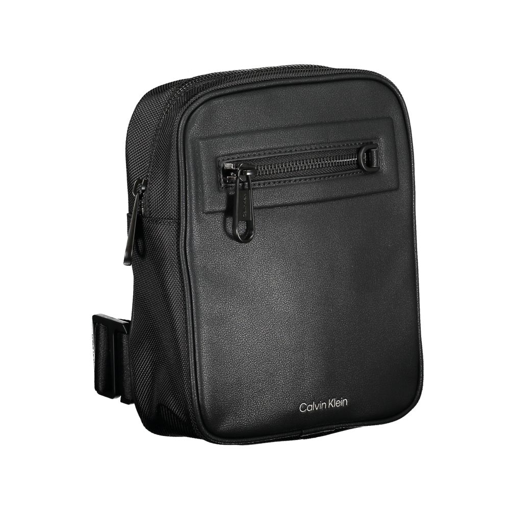 Front view with bag zipped and handles upright.