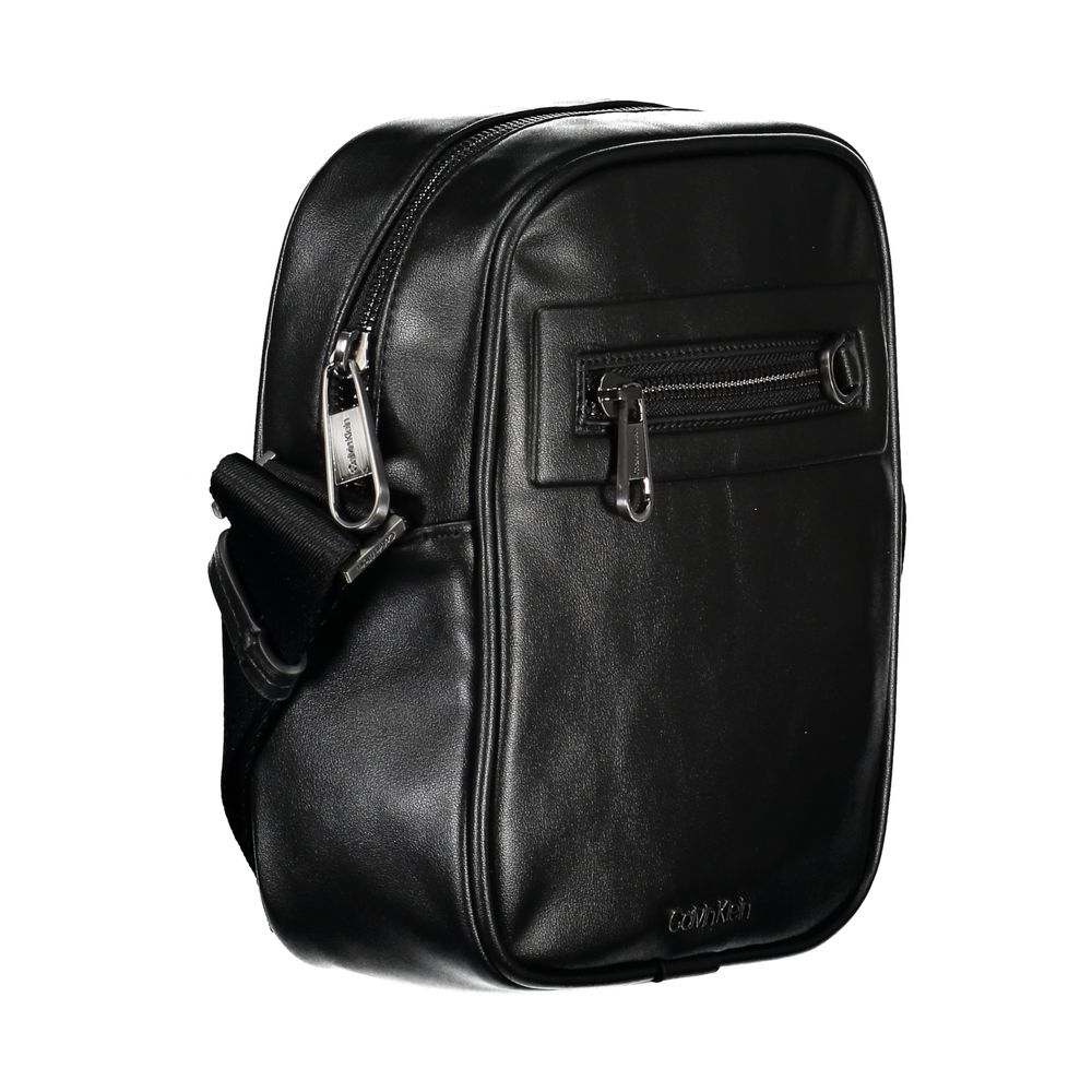Front view with bag zipped and handles upright.