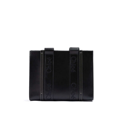 Chloé Black Woody Embroidered Logo Leather Medium Tote Bag with handles and spacious interior, sustainable fashion accessory.