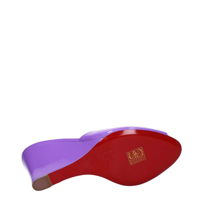 Christian Louboutin Purple Leather Wedge Sandals with red leather sole and open toe design, showing 9.5 cm wedge heel.