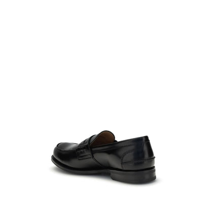 Church's Black Calf Leather Bos Taurus Slip-On Loafers with hand-stitched sides and smoked finish, showcasing elegant craftsmanship.