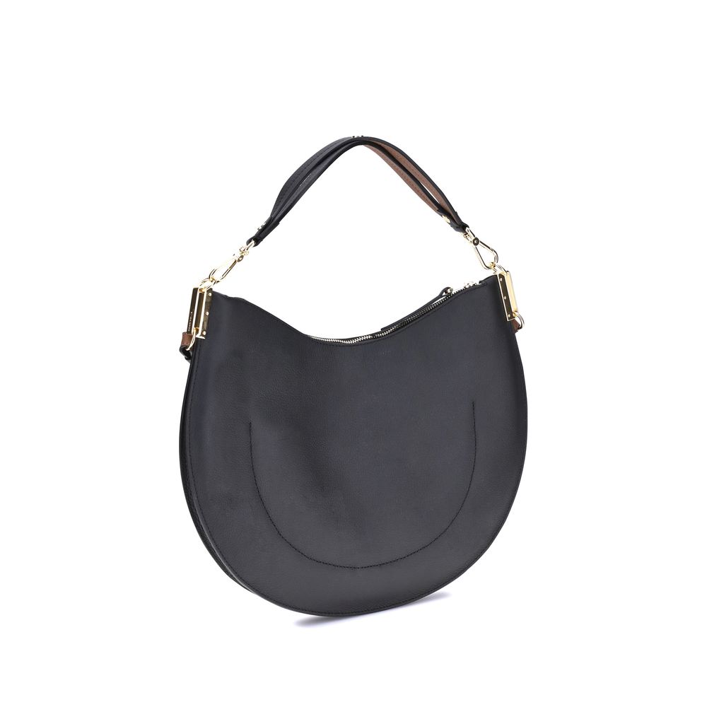Front view with bag zipped and handles upright.