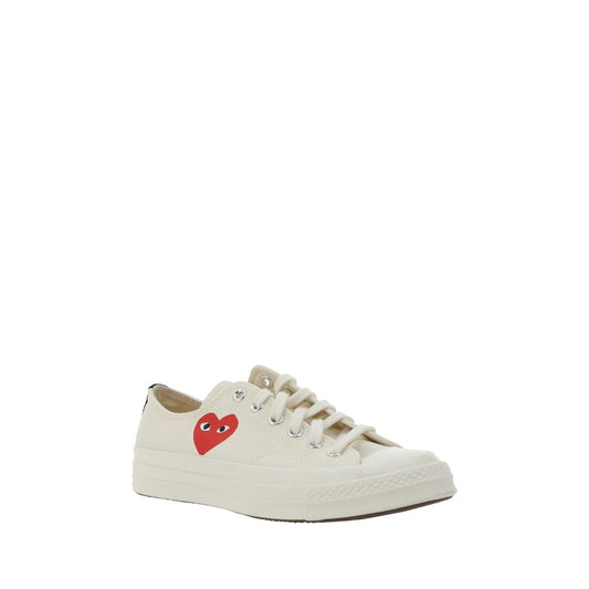 Comme Des Garçons Play x Converse Comme des Garcons Play x Converse Sneakers with heart logo and lace-up front.
