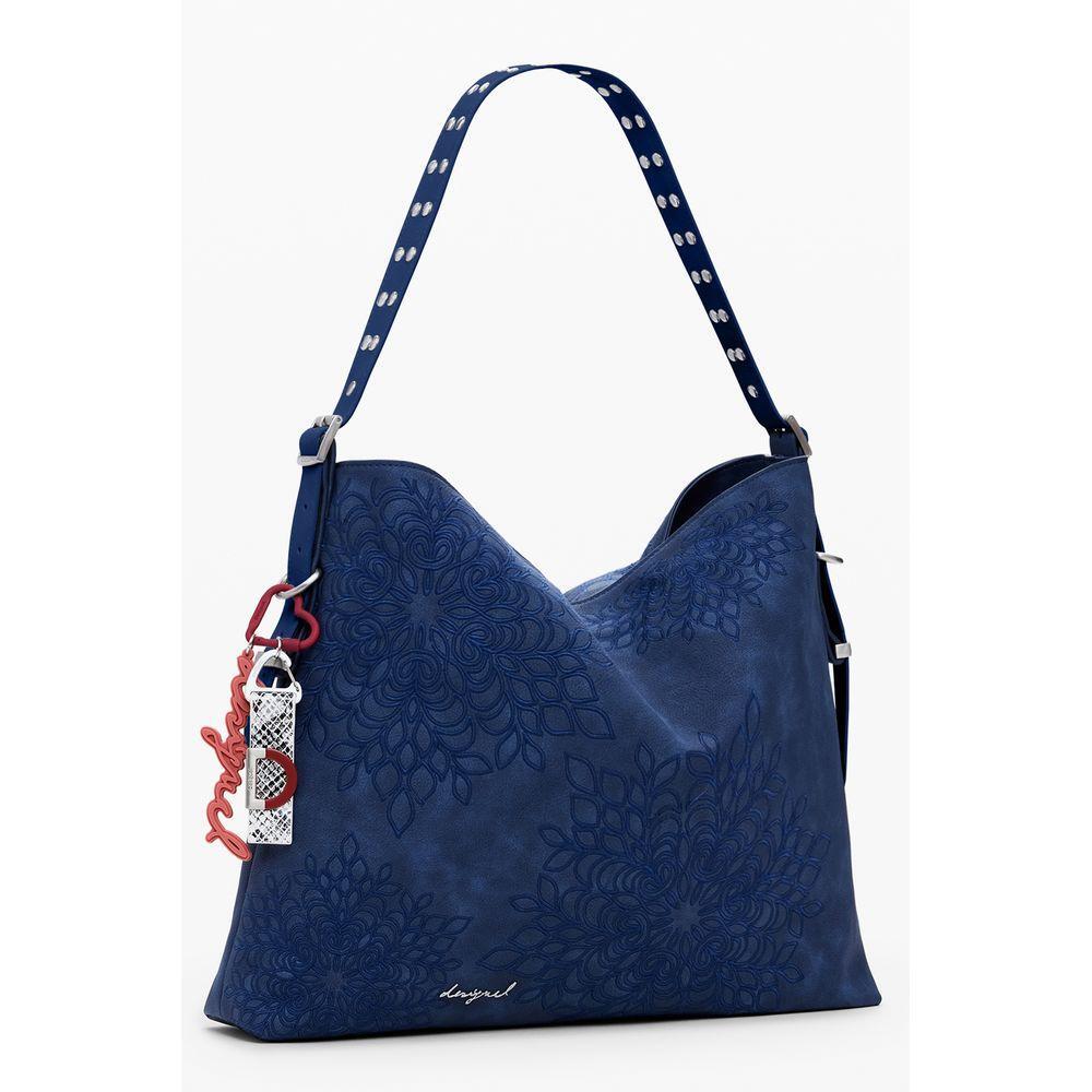 Front view with bag zipped and handles upright.
