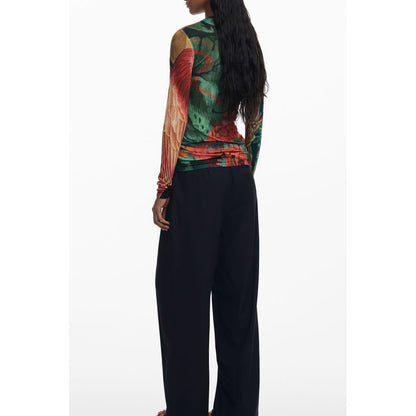 Back view of woman wearing Desigual Green Viscose Women Sweater with long sleeves and floral pattern, part of Lacroix Jersey collection.