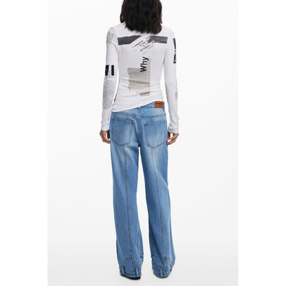 Back view of a model wearing Desigual White Viscose Women T-Shirt with avant-garde newspaper pattern and denim jeans.
