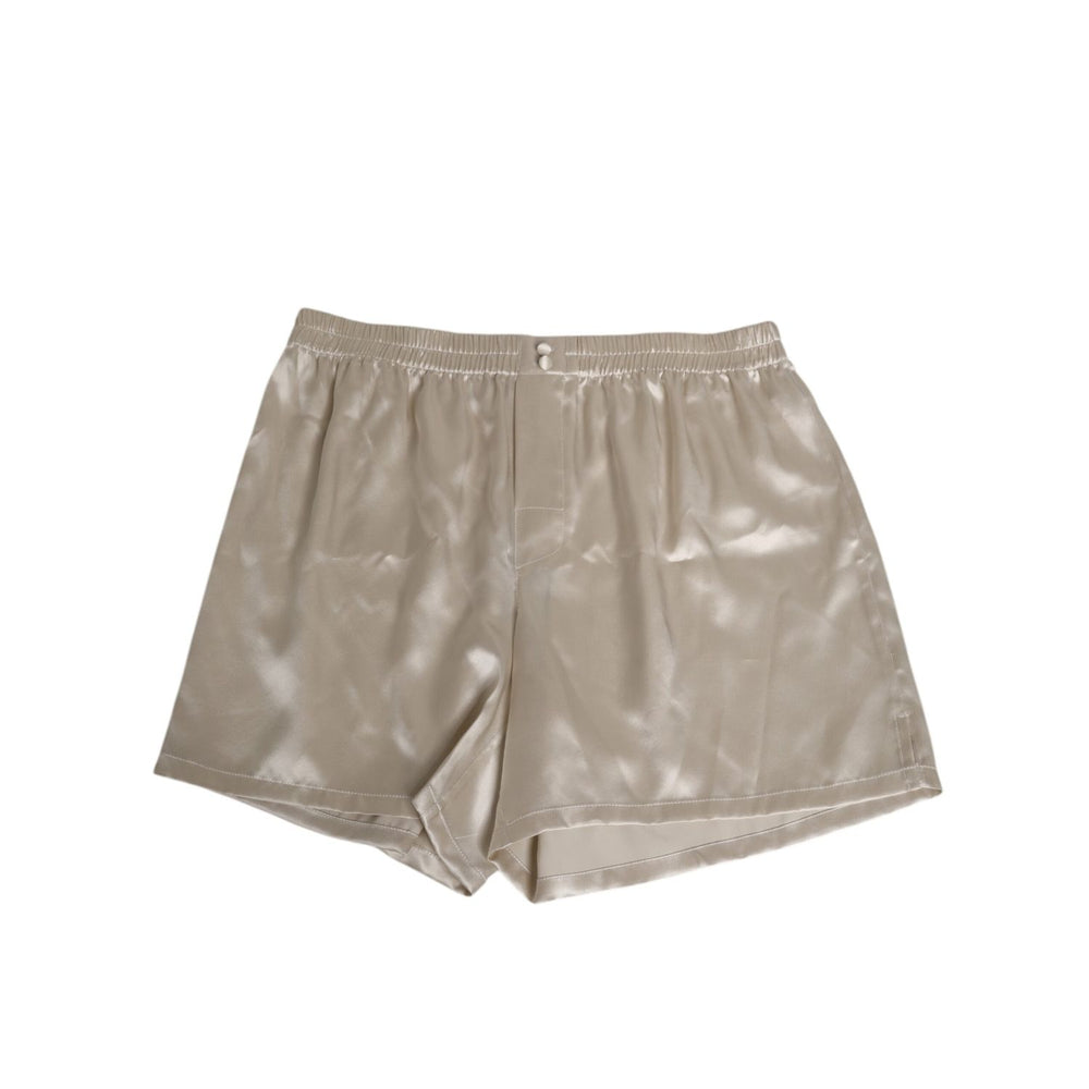 Dolce & Gabbana Beige Silk Satin Elastic Men Boxer Short Swimwear with button detail and luxury finish.