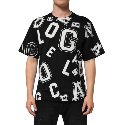 Man wearing Dolce & Gabbana Black Cotton Letter Print Short Sleeve T-shirt with white varsity-style logos.