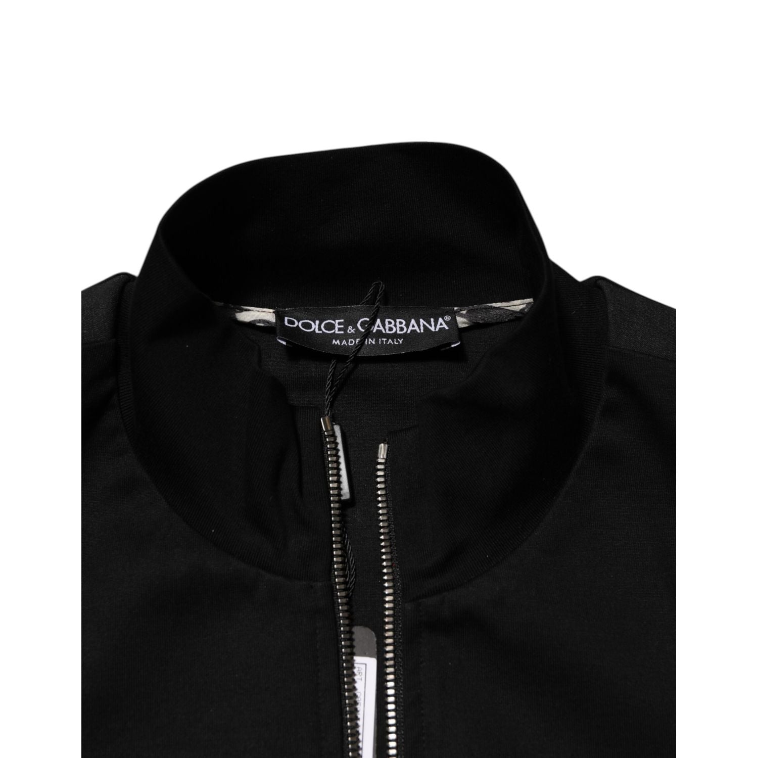 Front view with bag zipped and handles upright.