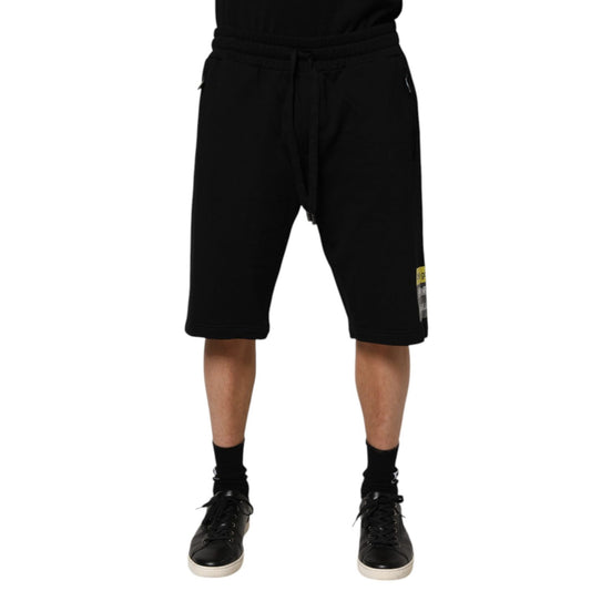 Dolce & Gabbana Black Cotton Mid Waist Casual Bermuda Short with drawstring and logo detailing, perfect for casual outings.