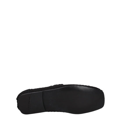 Sole view of Dolce & Gabbana Black Fabric Slip-On Loafers with leather outsole, showcasing casual style and round toe design.