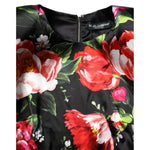Dolce & Gabbana Black Floral Fiori Pittorici Bodycon Dress with multicolor floral print on black fabric, close-up view.