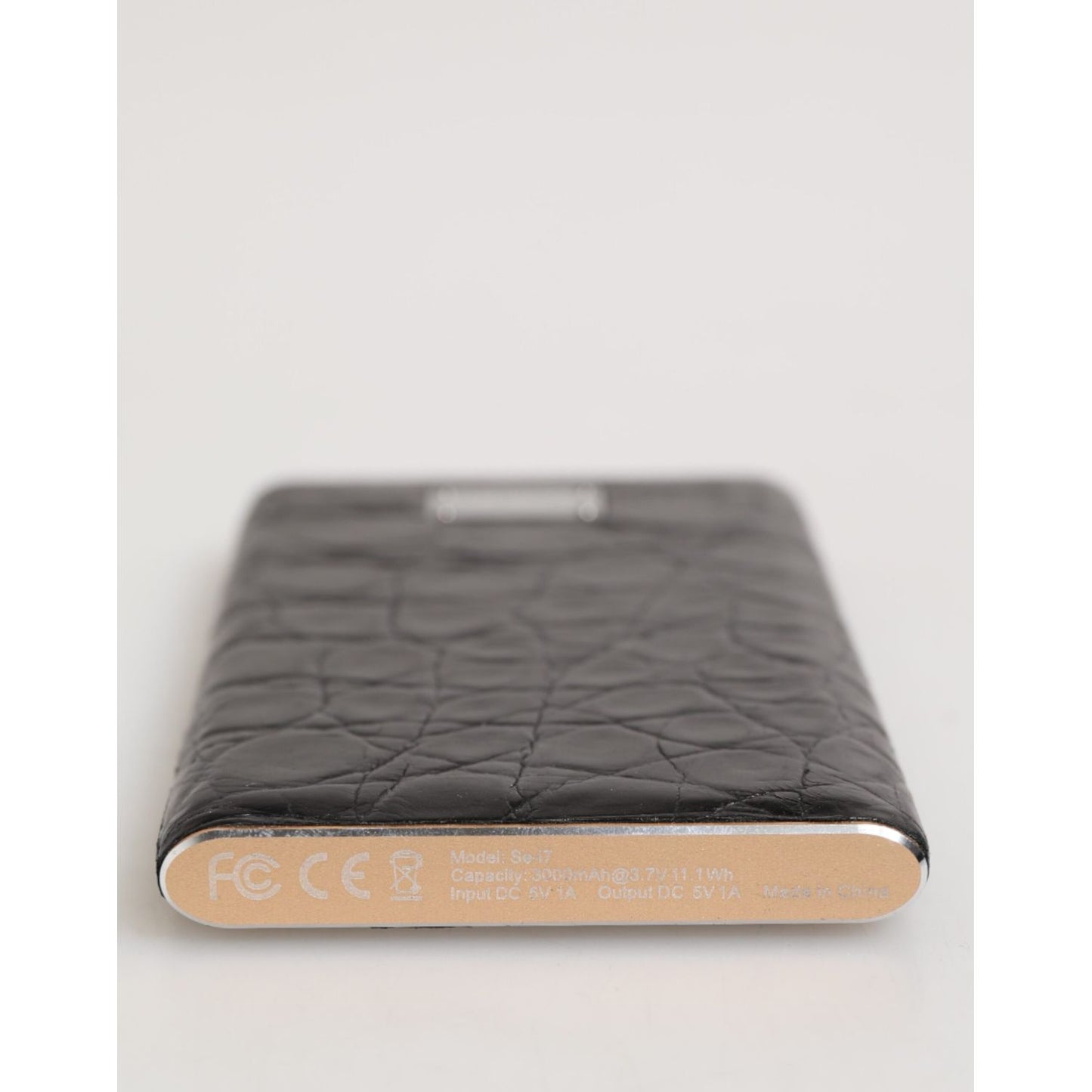 Dolce & Gabbana Black Leather Exotic Skin 3000mAh Power Bank Charger USB featuring luxurious texture and sleek design.