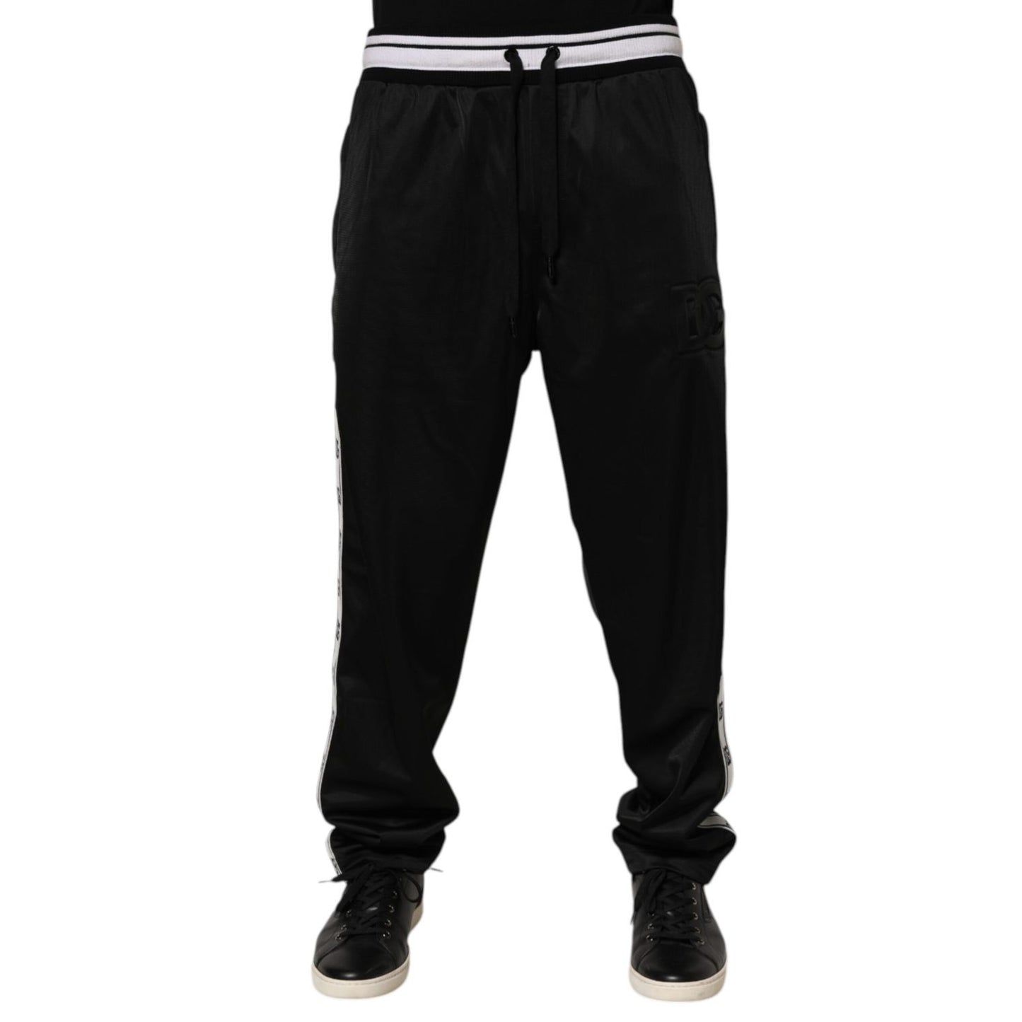 Dolce & Gabbana Black Polyester Logo Stripe Track Jogger Pants with drawstring waist and white logo stripes for stylish athleisure wear.
