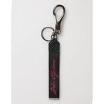 Dolce & Gabbana Black Red Polyester DG Logo Silver Men Keychain Keyring with silver-tone hardware and engraved logo details.